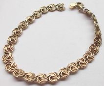 A hallmarked 9ct Gold Fancy Link Bracelet (catch defective) weighing approximately 3 ½ gm