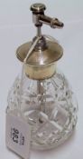 A mid-20th Century Cut Glass Scent Atomizer with engine-turned white metal lid, metal operating