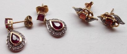 A pair of hallmarked 9ct Gold Ruby and small Diamond set Teardrop Cluster Earrings with further Ruby