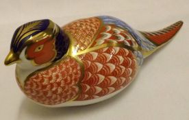 A Royal Crown Derby Paperweight, modelled as a cock pheasant, decorated in blue, gold and red,