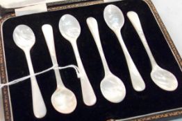 A cased set of six Mother-of-Pearl Coffee Spoons, retailed by J C B Craddock, Gold and Silversmiths,