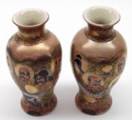 A pair of Satsuma Baluster Vases, brightly decorated in typical colours with immortals, (one with