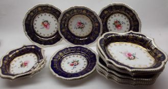 An early 19th Century English part Dinner Service, comprising five 9” Plates; three shaped Oval Side