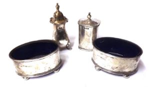 A group of four Silver Condiments including pair of Oval Salts, oval shaped on four cheese feet plus