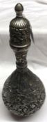 A probably 19th Century Persian grey metal (on Copper) baluster Wine Bottle with detachable push-