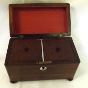 A 19th Century Rosewood Small Rectangular Tea Caddy, the plain lifting lid enclosing an interior