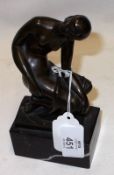 A 20th Century Bronze Study of a nude young maiden in seated position, raised on a rectangular