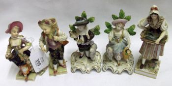 A group of five Sitzendorf/German Figurines, comprising a pair of grape-picking figures, a
