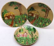 A group of three Shorter & Sons Dishes, decorated with raised design of cottage and gardens, the