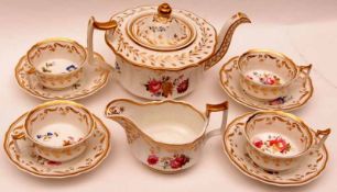 An extensive early 19th Century Tea/Coffee Service, decorated with floral sprays and gilt