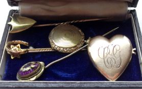 A Mixed Lot including an early 20th Century yellow metal heart-shaped Locket; a Victorian circular