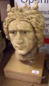 A French  Stone  Bust, modelled as a Crowned Head on a heavy base, 12 ½” high