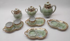 A Chinese Eggshell part Tea Service comprising three Cups on Tennis Saucers and one further