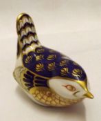 A Royal Crown Derby Paperweight, modelled as a wren, decorated in blue, red and gilt detail,