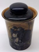 A Royal Doulton Series Ware Tobacco Jar, decorated with a monk in a cellar, (extensively cracked and