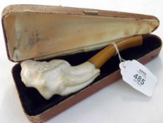 A Vintage Meerschaum Pipe, the bowl formed as a Maiden with an Amber effect stem, 6” long, in case