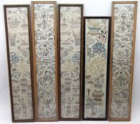 A collection of five Framed Oriental Mandarin Sleeves, each decorated with silk embroidered objects,