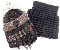 A 1920s Black Beadwork Evening Purse, with moulded clasp (damage to clasp); together with a Black