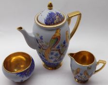 A Carlton Ware Coffee Service, decorated with scenes of golden pheasants amongst foliage on a