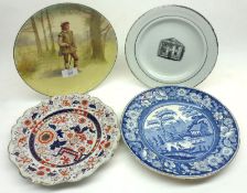 A Royal Doulton Series Ware Circular Plate, decorated with a scene titled verso “Orlando”; a further