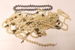 A large packet of assorted Freshwater Pearl and other Necklaces