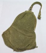 A good quality gilt metal Meshwork Evening Purse with engine-turned frame and metal fabric handle