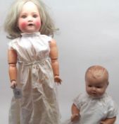 Schoenau and Hoffmeister  Bisque Socket Head Doll, with blue weighted sleep glass eyes, lashes