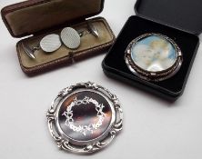 A cased pair of engine-turned white metal Cufflinks, the box stamped “Asprey, 166 Bond Street,