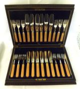 An early 20th Century Oak Cased Canteen of Plated Fish Knives and Forks with limited engraved