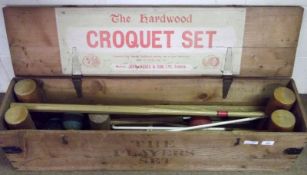 A Vintage Jaques Hardwood Croquet Set, original pine crate containing four hardwood mallets, set