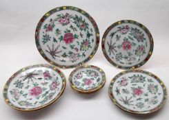 A collection of 20th Century famille rose Wares (decorated in Hong Kong), the centres all with