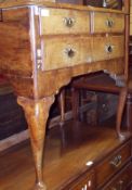 An 18th Century and later Walnut Low Boy, with two short and one full length drawer, raised on