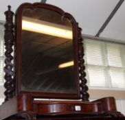A Victorian Mahogany Dressing Table Mirror, the shaped rectangular mirror plate supported on