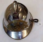 French Chromed and Brass Fire Helmet with badge, “Sapeurs Pompiers Rochechouart”, leather chip