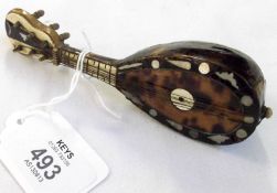 A Miniature Tortoiseshell and Mother-of-Pearl inlaid Mandolin, 5” long