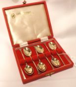 A cased set of six Elizabeth II Silver Gilt Coffee Spoons with seal ends, Sheffield 1972