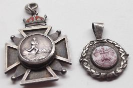 A white metal Maltese Cross Pendant with enamelled crown top, the centre with circular