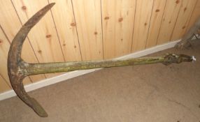 A heavy Cast Iron Ships Anchor of typical form, 56” long