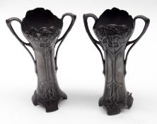 A pair of WMF style two-handled Pewter Spill Vases, embossed with Art Nouveau style foliage (