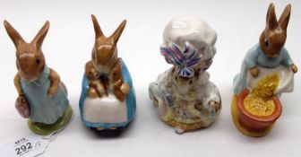 Four Beswick Beatrix Potter Models: “Mrs Flopsy Bunny”, BP3B; “Mrs Rabbit and Bunnies”, BP3B; “