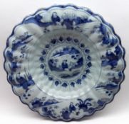 An 18th Century German Faience Blue and White Dish, decorated in underglaze blue design in the