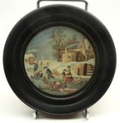 A small coloured Prattware Pot Lid: “Dangerous Skating” mounted in dark stained wooden socle,