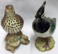A Beswick Model of a lapwing, No 2416 (one wing repaired); together with a Beswick Model of a song
