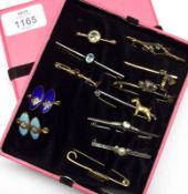 A collection of twelve assorted early 20th Century Bar Brooches, including one with dog mount