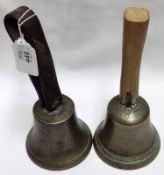 Two Vintage Brass Hand Bells, one with wooden handle and the other with leather