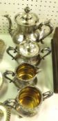 An early/mid-20th Century Four Piece Electroplated Tea Set, engraved with vacant cartouches to a