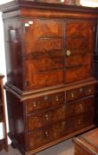 An early 18th Century Walnut Escritoire, the upper section with central cupboard enclosing two