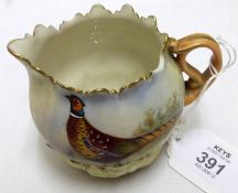 A small Locke & Co Worcester Cream Jug with frilled rim, painted with design of cock pheasant,