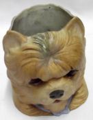 A delightful German Bisque childs light modelled as a terrier’s face, 4” high