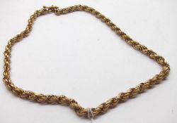 A good quality Victorian gilt metal multi-link rope twist Neck Chain with hand mount and later